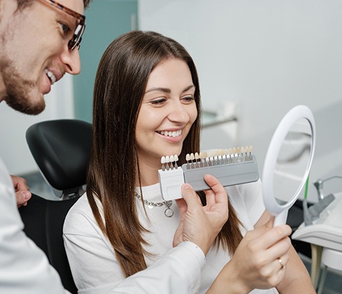 a patient selecting their veneers