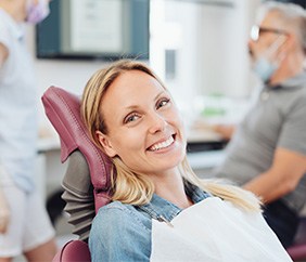 Woman smiling in the dental chair