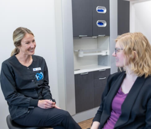 two people smiling with dental bridges in Mankato