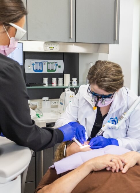 Young man with healthy smile after restorative dentistry