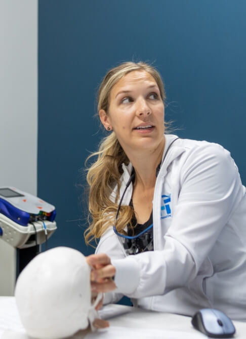 Frustrated woman next to snoring man in need of sleep apnea therapy